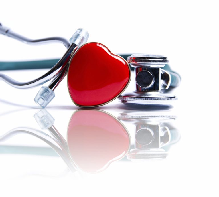 Stethoscope curled around a red heart